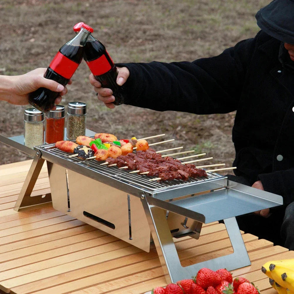 1 + 1 GRATIS - Tragbarer Camping BBQ Grill